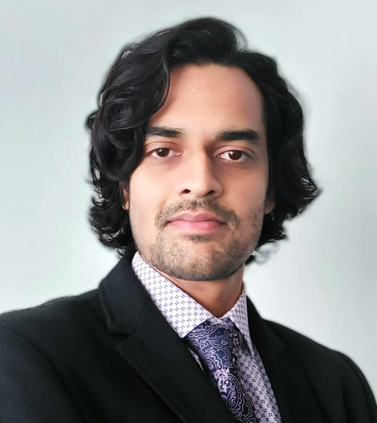Dr. Anuj